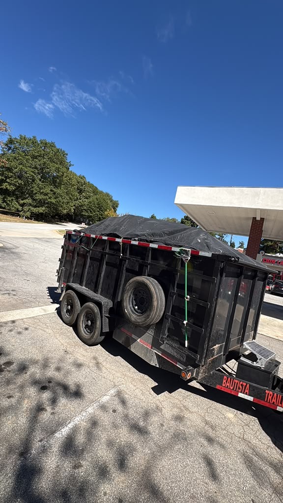Gonzalez Dump Trailer loaded at gas station